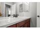 Bathroom featuring a white countertop, a vessel sink, and a modern faucet at 6135 S Paris St, Englewood, CO 80111