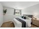 Serene bedroom showcasing a comfortable bed, soft lighting, and calming neutral tones at 9740 W 104Th Dr, Westminster, CO 80021