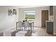 Cozy dining area featuring natural light, modern furnishings, and an open layout at 9740 W 104Th Dr, Westminster, CO 80021