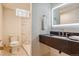 Modern basement bathroom, featuring a sleek vanity and shower at 5022 E 17Th Ave, Denver, CO 80220