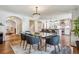 Open concept dining room with a view into the kitchen at 5022 E 17Th Ave, Denver, CO 80220