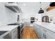 Spacious kitchen featuring stainless steel appliances, modern cabinetry, and a large center island at 6088 S Lakeview St, Littleton, CO 80120