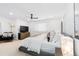Large bedroom boasts neutral carpet, white walls, and stylish decor at 6088 S Lakeview St, Littleton, CO 80120