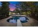 Backyard oasis featuring a sparkling swimming pool, diving board, and outdoor seating area at 6088 S Lakeview St, Littleton, CO 80120