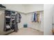 Large walk-in closet with ample shelving and hanging space at 2147 Prairie Smoke Dr, Monument, CO 80132