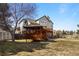 Expansive backyard with a gazebo and deck, perfect for outdoor entertaining at 50 Deerwood Dr, Littleton, CO 80127