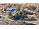 Aerial view showcasing the community pool, playground, and recreation areas at 50 Deerwood Dr, Littleton, CO 80127