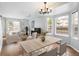 Bright living room with hardwood floors, fireplace, and large windows offering abundant natural light at 1885 S Quebec Way # M101, Denver, CO 80231