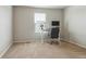 Bedroom with plush carpet and large window with blinds, ideal for an office space at 6491 N Danube St, Denver, CO 80249