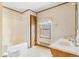 Bathroom featuring a vanity and tub with shower at 540 Hickory St, Hudson, CO 80642