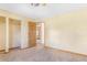 Bedroom with carpet, neutral paint, and closet at 540 Hickory St, Hudson, CO 80642