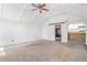 Spacious living room with vaulted ceilings, carpet and an open layout for entertaining at 540 Hickory St, Hudson, CO 80642