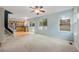 Bright living area with hardwood floors in the kitchen, and a sliding door to the fenced yard at 18121 E Adriatic, Aurora, CO 80013