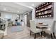 Cozy dining area with decorative plate shelving and office space with natural light at 5207 Denim Ct, Parker, CO 80134