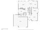 Floor plan displaying the layout of the first floor, including the kitchen, living room, and garage at 5207 Denim Ct, Parker, CO 80134