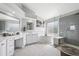 Luxurious bathroom with a soaking tub, walk-in shower, and double vanity at 5207 Denim Ct, Parker, CO 80134