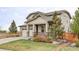 Charming two-story home featuring a well-maintained lawn and inviting front porch at 500 176Th Ave, Broomfield, CO 80023