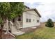 Charming home exterior featuring a well-maintained lawn, mature landscaping, and a cozy porch at 500 176Th Ave, Broomfield, CO 80023