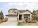 Charming two-story home featuring stone accents, neutral siding, and an attached two car garage in a well-kept neighborhood at 500 176Th Ave, Broomfield, CO 80023
