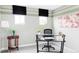 Modern office space with natural light from a dual set of windows, and a glass desk at 500 176Th Ave, Broomfield, CO 80023