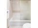 Bathroom showcases shower with translucent glass door, offering style and privacy at 14939 E Harvard Ave, Aurora, CO 80014