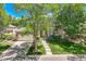 Charming brick home with mature trees, well-kept lawn, and welcoming curb appeal at 85 Silver Fox Dr, Greenwood Village, CO 80121