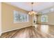 Bright living area with hardwood floors, large windows, and an open flow at 85 Silver Fox Dr, Greenwood Village, CO 80121