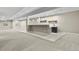 Finished basement featuring plush carpet, recessed lighting, and a wet bar with custom shelving at 16250 Kenosha St, Brighton, CO 80603