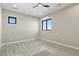 Bright bedroom featuring neutral walls, carpeted floors, natural light, and a modern ceiling fan at 16250 Kenosha St, Brighton, CO 80603