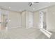 Bedroom featuring plush carpeting, multiple doors, and a view of the second floor at 16250 Kenosha St, Brighton, CO 80603