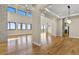 Bright and open living area with large windows and hardwood floors at 16250 Kenosha St, Brighton, CO 80603