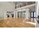 Spacious living area featuring hardwood floors and an open layout at 16250 Kenosha St, Brighton, CO 80603