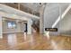 Modern living room with a fireplace and hardwood floors at 16250 Kenosha St, Brighton, CO 80603