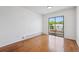 Bright bedroom with sliding door and ample space to relax, complemented by a private balcony at 6007 Yarrow St # I, Arvada, CO 80004