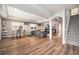 Spacious finished basement with gray floors, and recreational area at 8548 Winter Berry Dr, Castle Pines, CO 80108