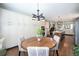Charming dining area with built-in storage, access to the kitchen, and stylish decor at 8548 Winter Berry Dr, Castle Pines, CO 80108