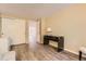 Bedroom featuring hardwood floors, a black desk, and closet at 14193 E Radcliff Cir, Aurora, CO 80015