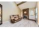 Cozy living room with wood floors, brick fireplace, and plenty of natural light at 14193 E Radcliff Cir, Aurora, CO 80015