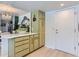 Kitchen featuring cabinets, pantry, and marble countertops at 13908 E Linvale Pl, Aurora, CO 80014