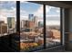 Breathtaking cityscape view from a large window, showcasing city's vibrant skyline at 1750 Wewatta St # 1940, Denver, CO 80202