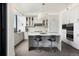 Modern kitchen with island, stainless steel appliances, and city views at 1750 Wewatta St # 1940, Denver, CO 80202