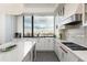 Modern kitchen with city views and high-end appliances at 1750 Wewatta St # 1940, Denver, CO 80202