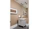 Sophisticated powder room with a sleek vanity and unique lighting at 1750 Wewatta St # 1940, Denver, CO 80202