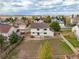 Aerial view of the backyard with a fence and neighboring homes at 5934 Kingsfield St, Castle Rock, CO 80104