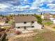 Backyard view with a fence, patio, and lawn area at 5934 Kingsfield St, Castle Rock, CO 80104
