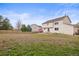 Large backyard featuring ample lawn space with perimeter fencing at 5934 Kingsfield St, Castle Rock, CO 80104