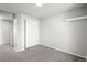 Cozy bedroom with plush carpeting and a double-door closet at 5934 Kingsfield St, Castle Rock, CO 80104