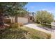 Charming two-story home featuring a brick facade and well-maintained landscaping at 5934 Kingsfield St, Castle Rock, CO 80104