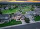 Aerial view of home showcasing its prime location near green spaces and a winding trail at 9537 Chesapeake St, Highlands Ranch, CO 80126