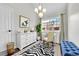 Inviting home office with hardwood floors, decor, and ample sunlight at 980 S Dahlia St # F, Denver, CO 80246